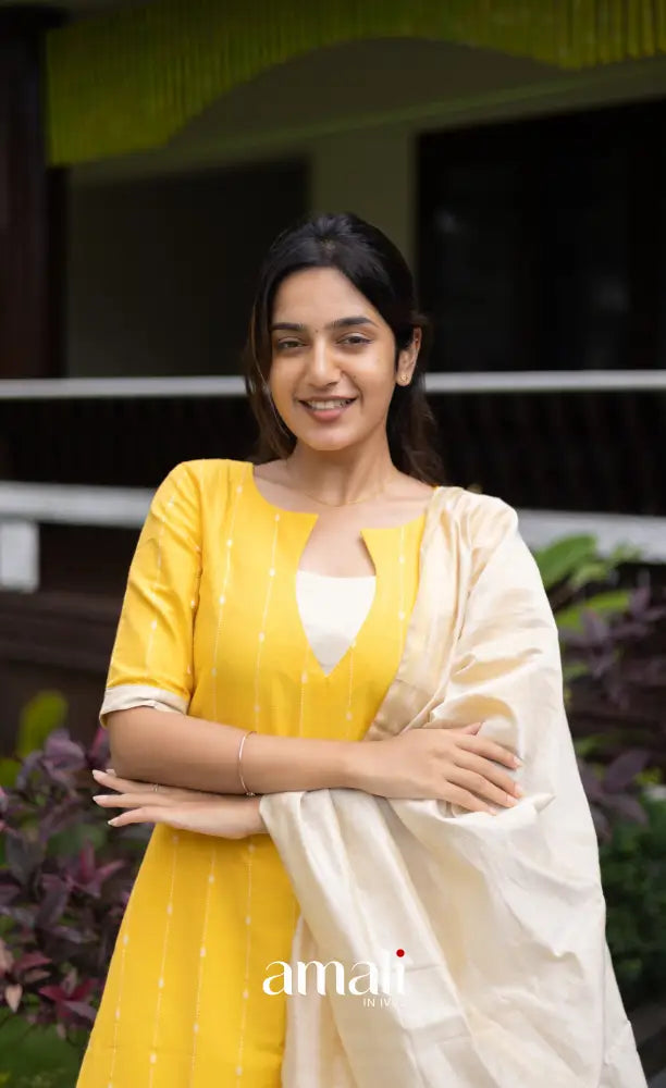 Athira Salwar - Off white and Yellow salwar