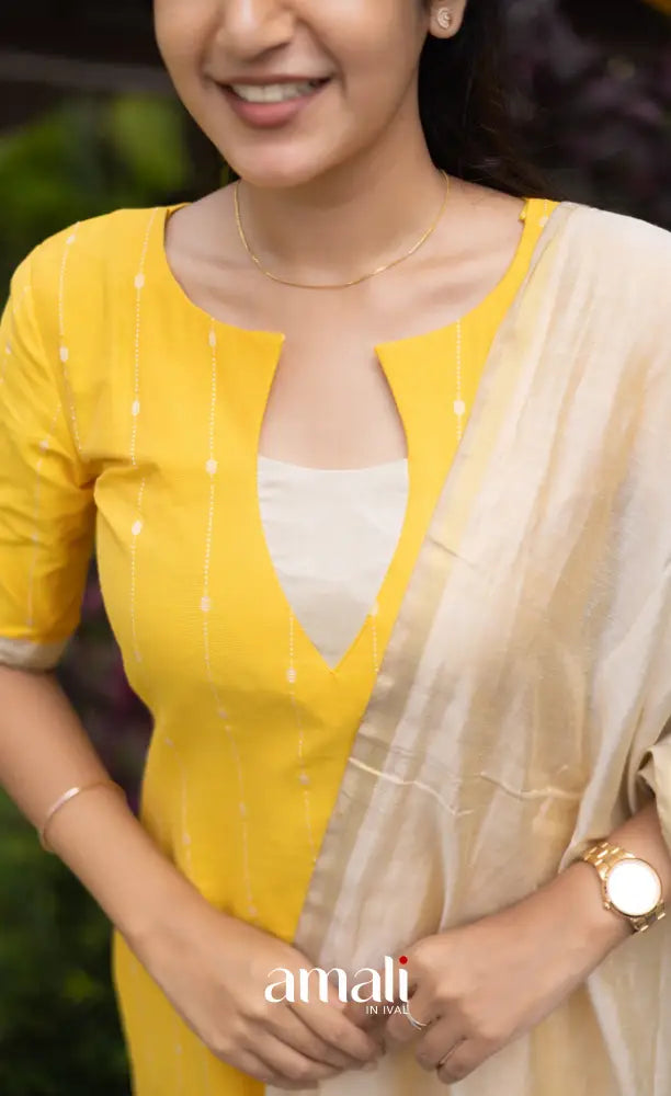 Athira Salwar - Off white and Yellow salwar