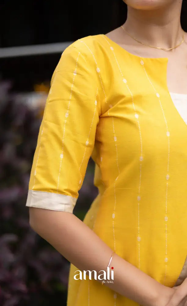 Athira Salwar - Off white and Yellow salwar